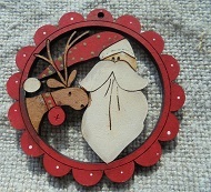 Santa with deer in scallop red 6cm decoration