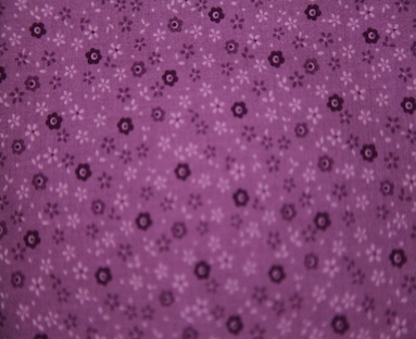 Stof - small flower on purple